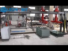 横軸と垂直のスラブを自動で卸す機械